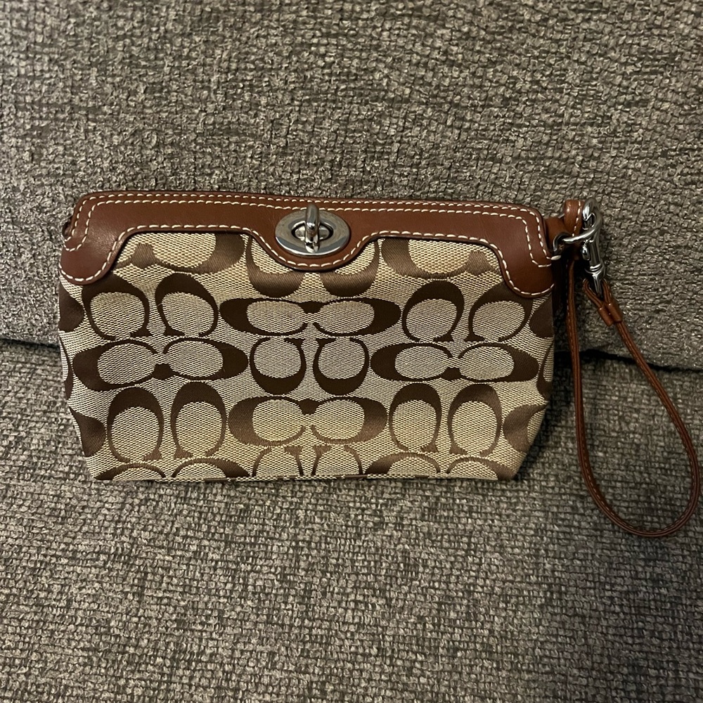 Coach Brown and Tan Clutch with Signature Monogram